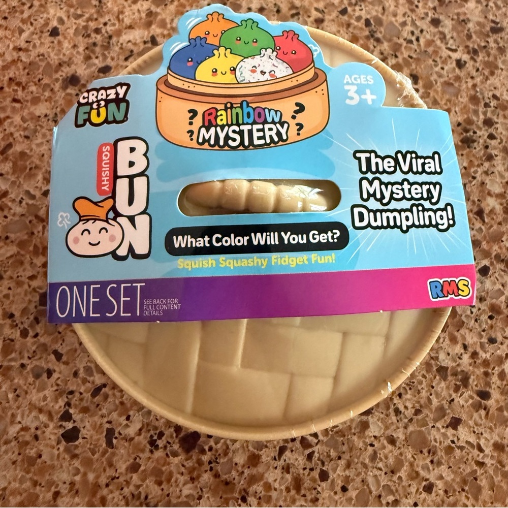 NWT Rainbow mystery Squishy bun dumpling sensory toy